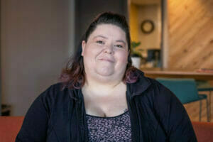 Successful Avivo participant poses for a photo.