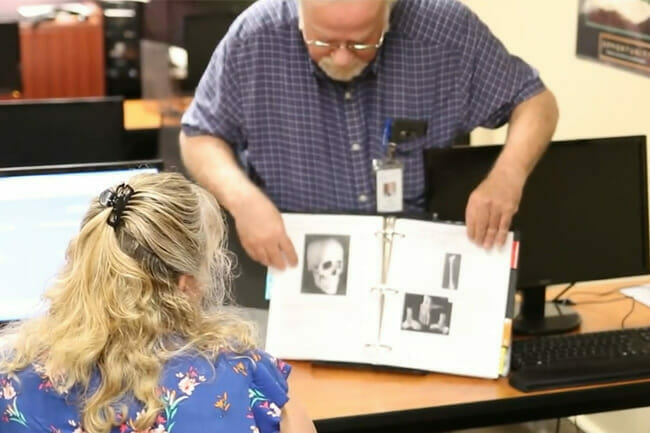 Student learns about medical office terminology as part of Avivo's Medical Office Support career training program.