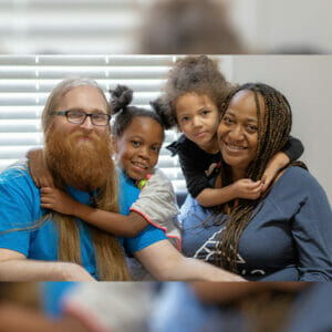 Takeerah and her family pose for the camera as they celebrate her success.