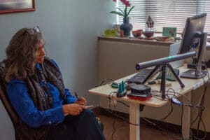 Bharati Acharya, mental health professional at Avivo, uses a modern EMDR setup at Avivo's Mental Health Clinic.