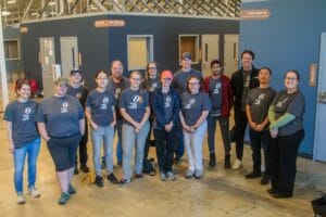 A group of Xcel Energy volunteers who spent the day volunteering at Avivo Village.