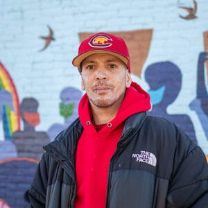 Ryan, a successful Avivo participant in Avivo's treatment programs and career education programs, poses for a photo.