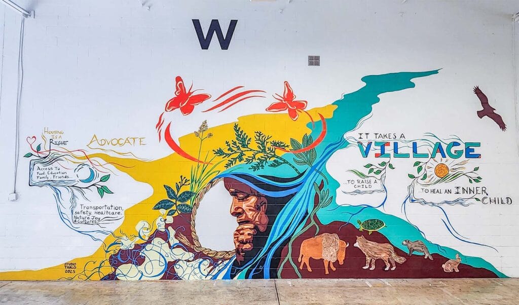 The finished product of a mural at Avivo ArtWorks that spans most of a huge wall on the west side of the building.