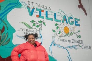 Desha, a former resident of Avivo Village who has moved into permanent housing, with Avivo's help.