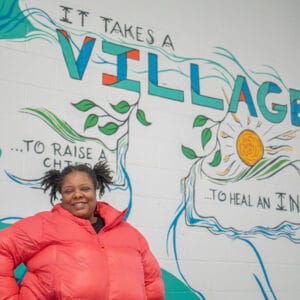 Desha, a former resident of Avivo Village who has moved into permanent housing, with Avivo's help.
